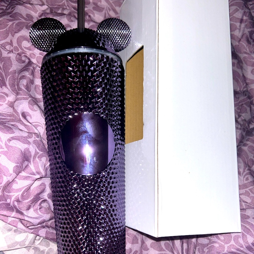 Purple tumbler cup with little ears, brand new, and comes with straw.